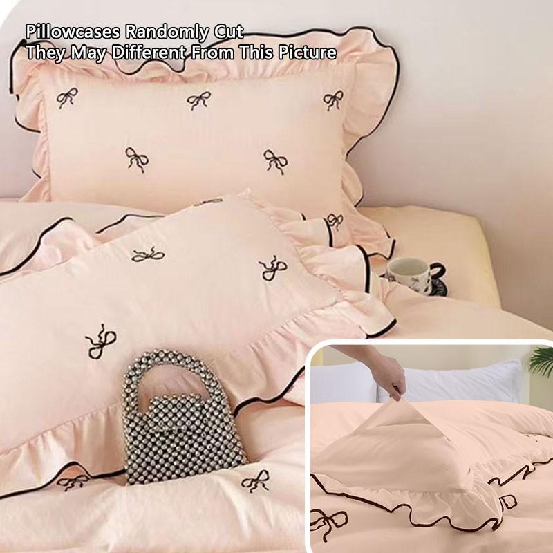 3-Piece Pink Bow Bedding Set with ruffled duvet cover and pillowcases, without fillers, a must-have for exquisite home decor.