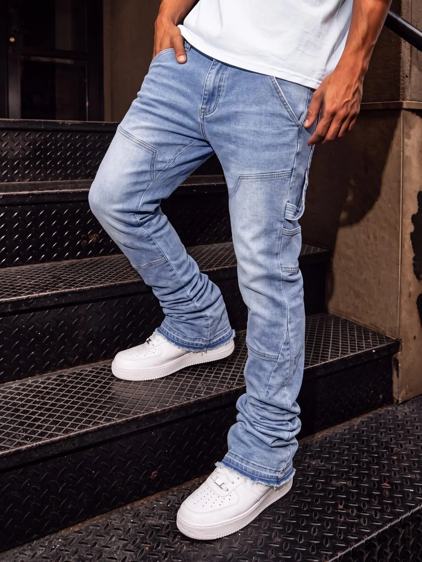 Men's slim fit micro flared stacked Denim jeans, stretchy slim fit, light washed distressed craftsmanship, logging workwear pants