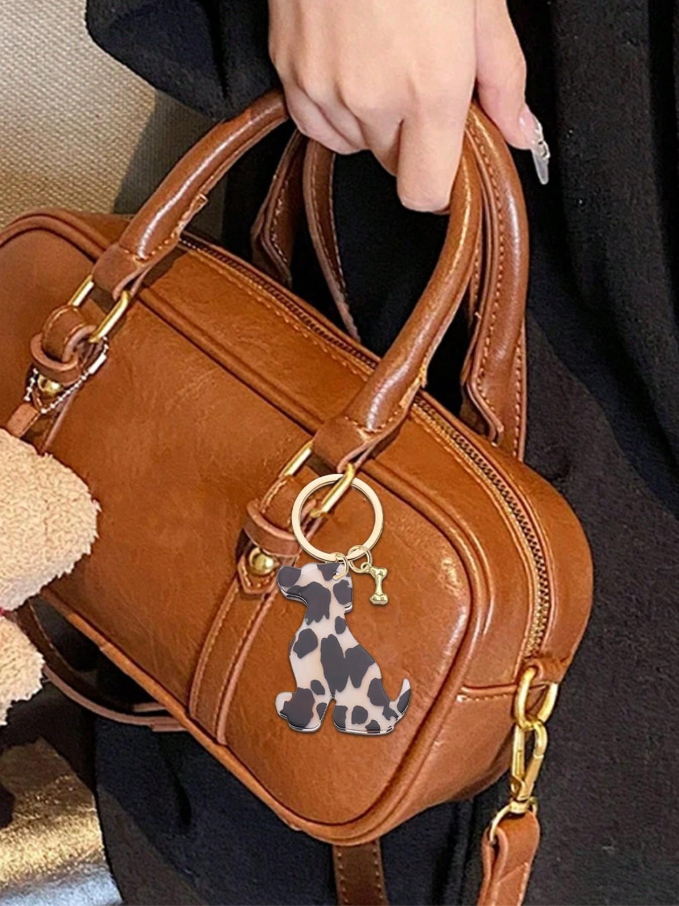 Double-sided acrylic leopard print cat and dog bone keychain, a fashionable, classic, and cool animal-themed bag accessory and DIY jewelry component. Can be attached to backpacks, handbags, car keys, house keys, and phone accessories. Versatile Attachment