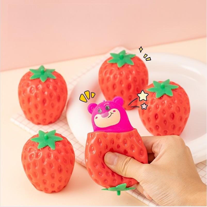 Realistic Strawberry Squeeze Toy — give it a squeeze and a cute little bear pops out 🍓🐻! An ultra-bouncy, squeezable sensory stress-relief toy, perfect for parent-child interaction and a great icebreaker for social gatherings.