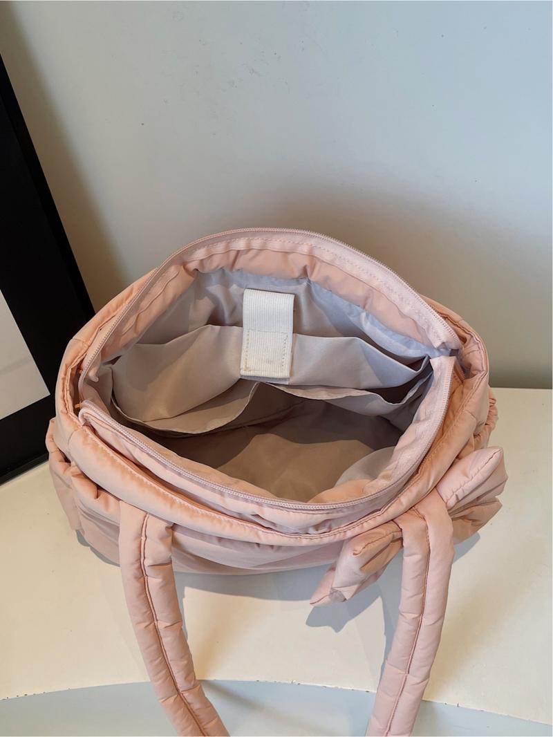 Pink quilted bow tote bag, a gentle, casual, lightweight, and spacious shoulder bag, Casual commuter bag, suitable for commuting, shopping, leisure outings, and everyday accessories.