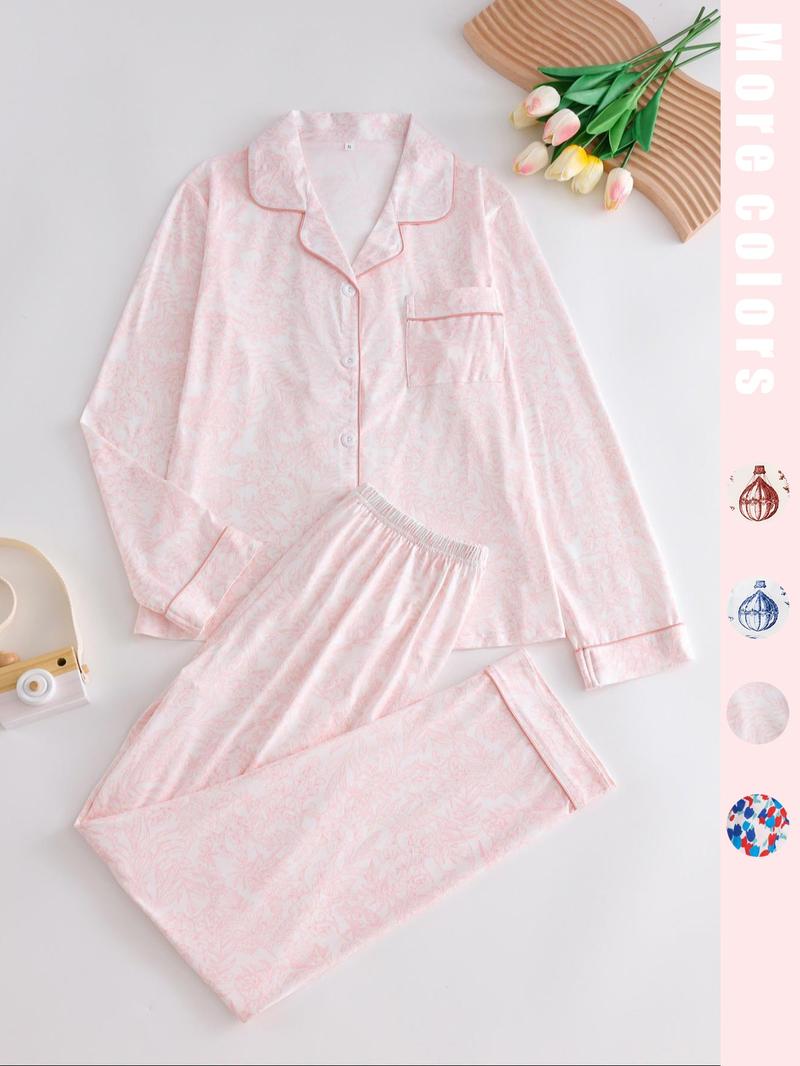 Two-piece pink ladies' pajama set with full-color prints. Button-front collar shirt and elastic waist pants pajama. Casual and comfortable collar long-sleeved top and long pants pajama set. Ladies' pajamas for spring and autumn.
