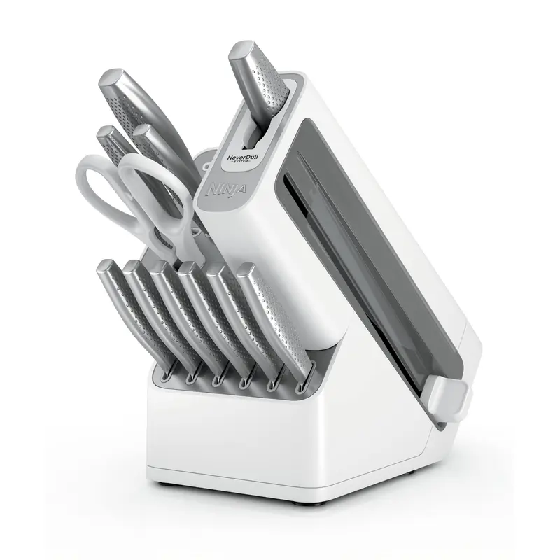 White knife storage block with stainless steel knives and kitchen shears