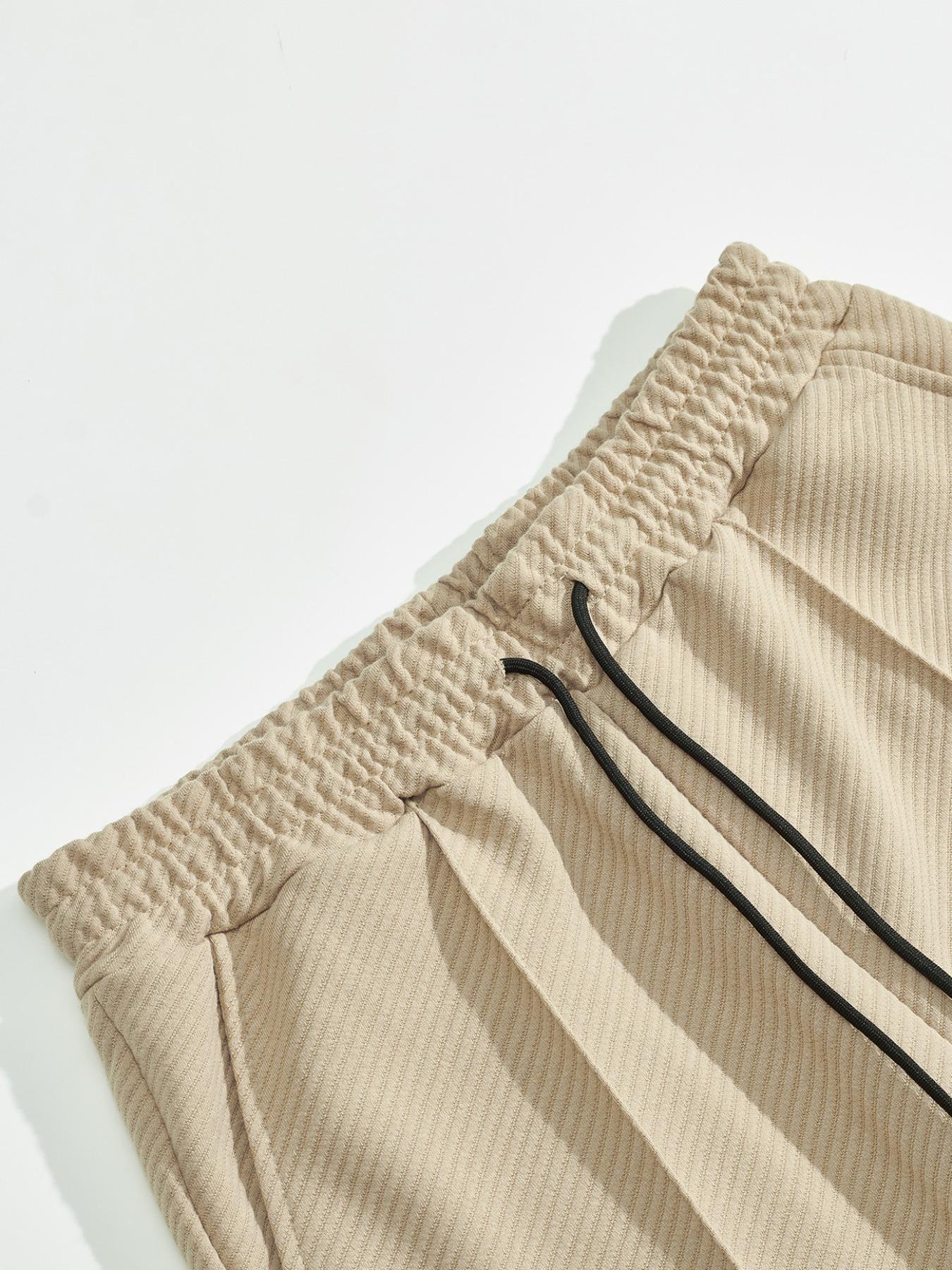 Men's two-piece casual suit outfit with a stand-up collar, long sleeves with a subtle texture, and long pants. The top has a single- button front with a pocket, suitable for daily outings, casual commuting, and light business casual occasions. Men's suit.