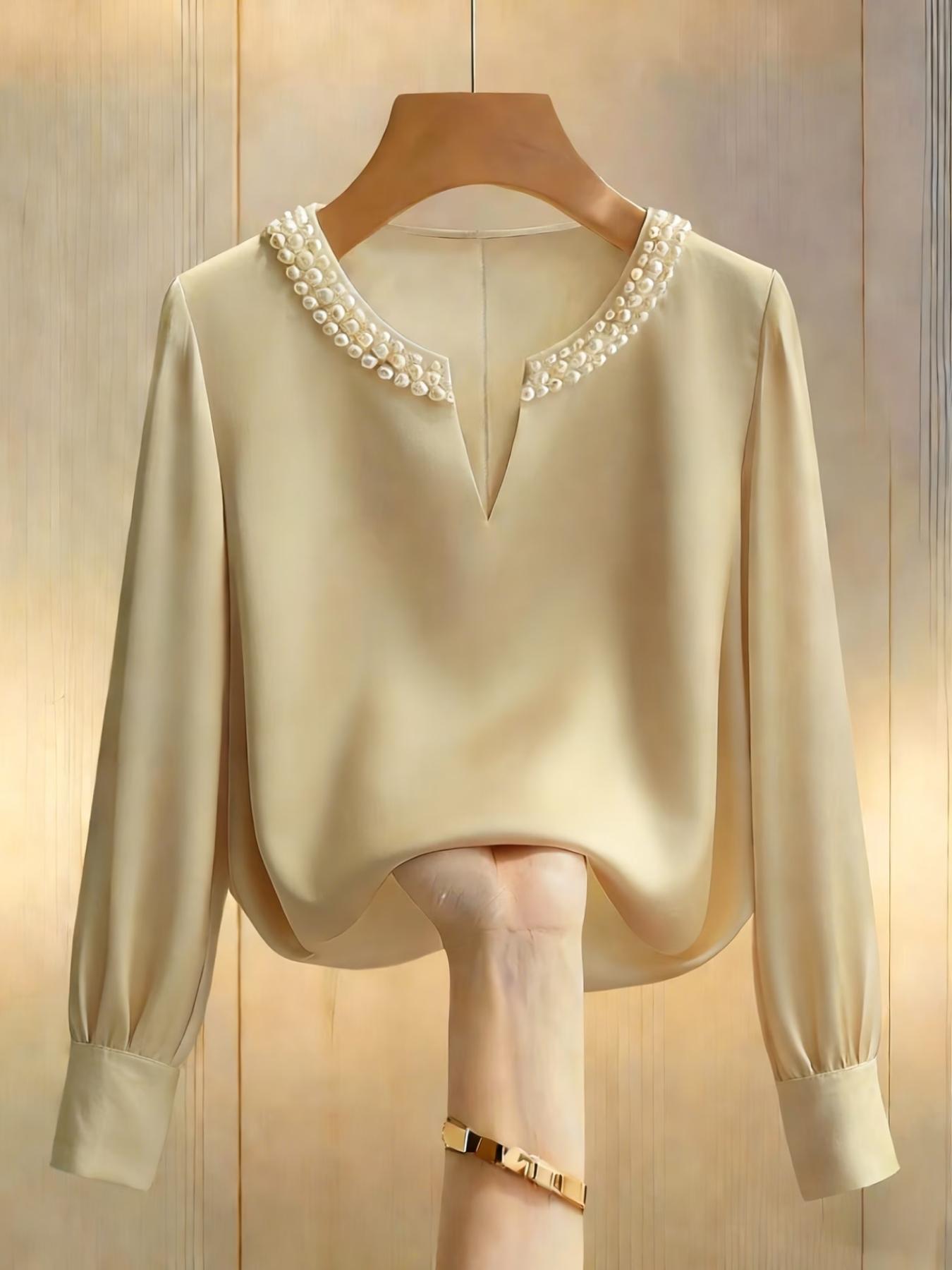 A women's pearl collar top, Blouse, with a V-neck small open neck, loose and versatile, showing off a slimming temperament. It is suitable for summer, business negotiations, customer meetings, commuting