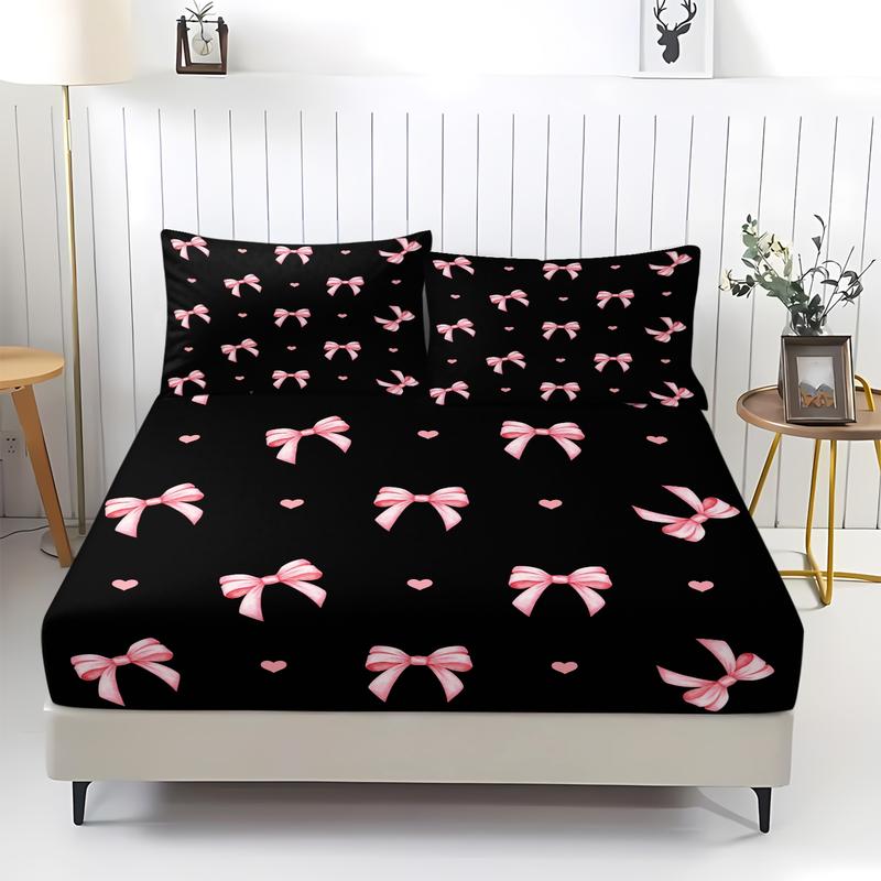 3-piece Bedding Set Features A Black Background With Pink Bow And Heart Prints, Including A Fitted Sheet And Two Unfilled Pillowcases. The Design Blends Two Elements, Creating A Romantic And Sweet Yet Cool Bedroom Décor, Gift Choice, Bed Sheet Sets