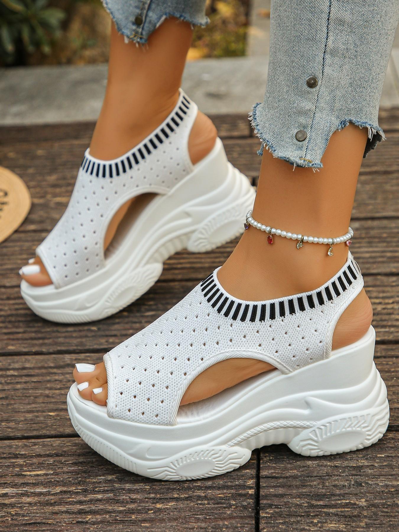 The new women's wedge heel sandals for the summer of 2026, with thick soles and high heels, are fashionable and stylish with a sponge sole. The fusion of fashion and comfort makes you the focus of summer. Fashionable Heeled Sandals