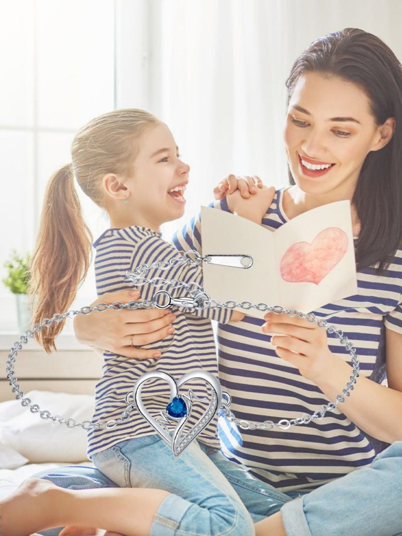 MOM Heartbeat · Blue Glow Simple luxury high-end heart-shaped MOM bracelet, elegant and warm.Paired with a surprise double-door preserved rose jewelry gift box.Ideal gift for birthdays, Mother’s Day and Valentine’s Day.