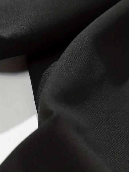 Men's black casual trousers with cross pattern print, elastic waist drawstring pants, suitable for autumn and winter wear.