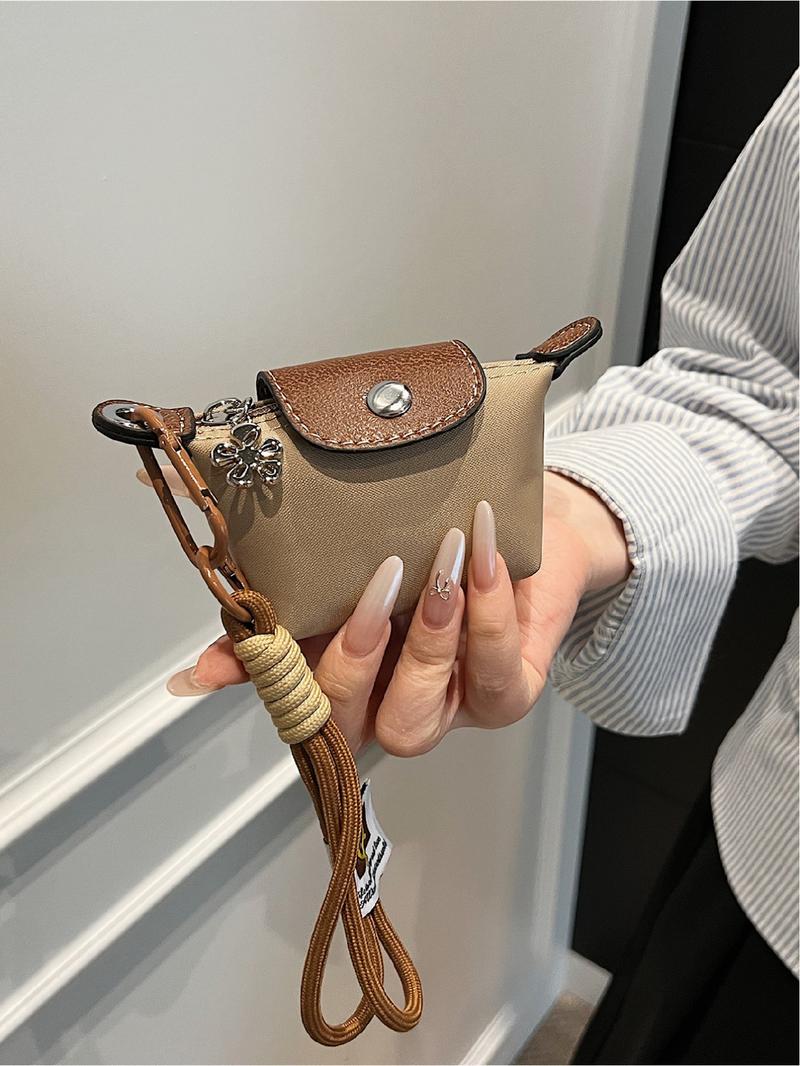 Mini women's flip button casual and compact handbag, wrist pocket, multiple colors to choose from, suitable for daily clothing matching, fashionable for going out.