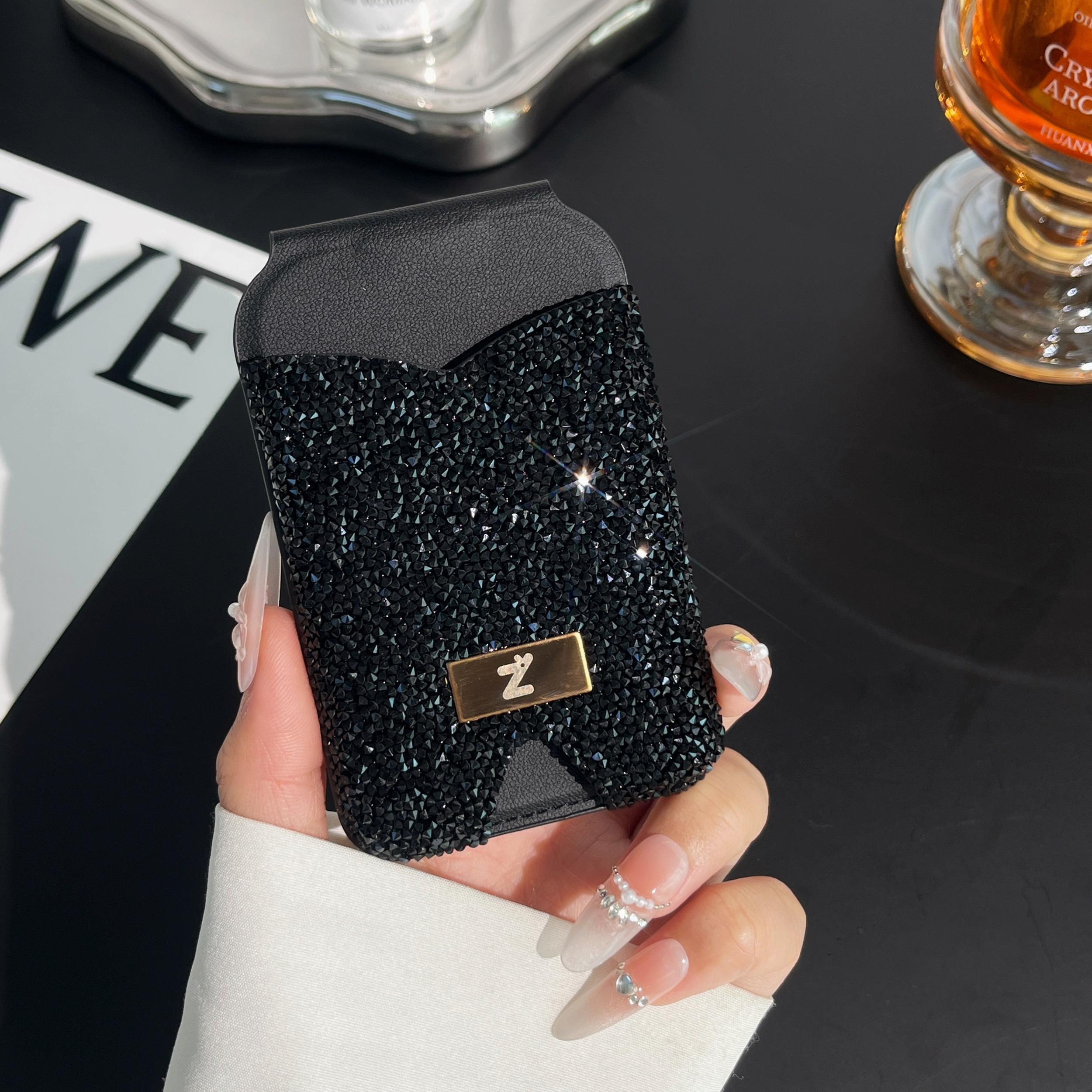 Strong magnetic anti-lost diamond phone holder with card holder and mirror. Lightweight and portable. Strong magnetic absorption of mobile phones. Can hold credit cards and ID cards. Suitable for magnetic mobile phones and magnetic mobile phone cases.