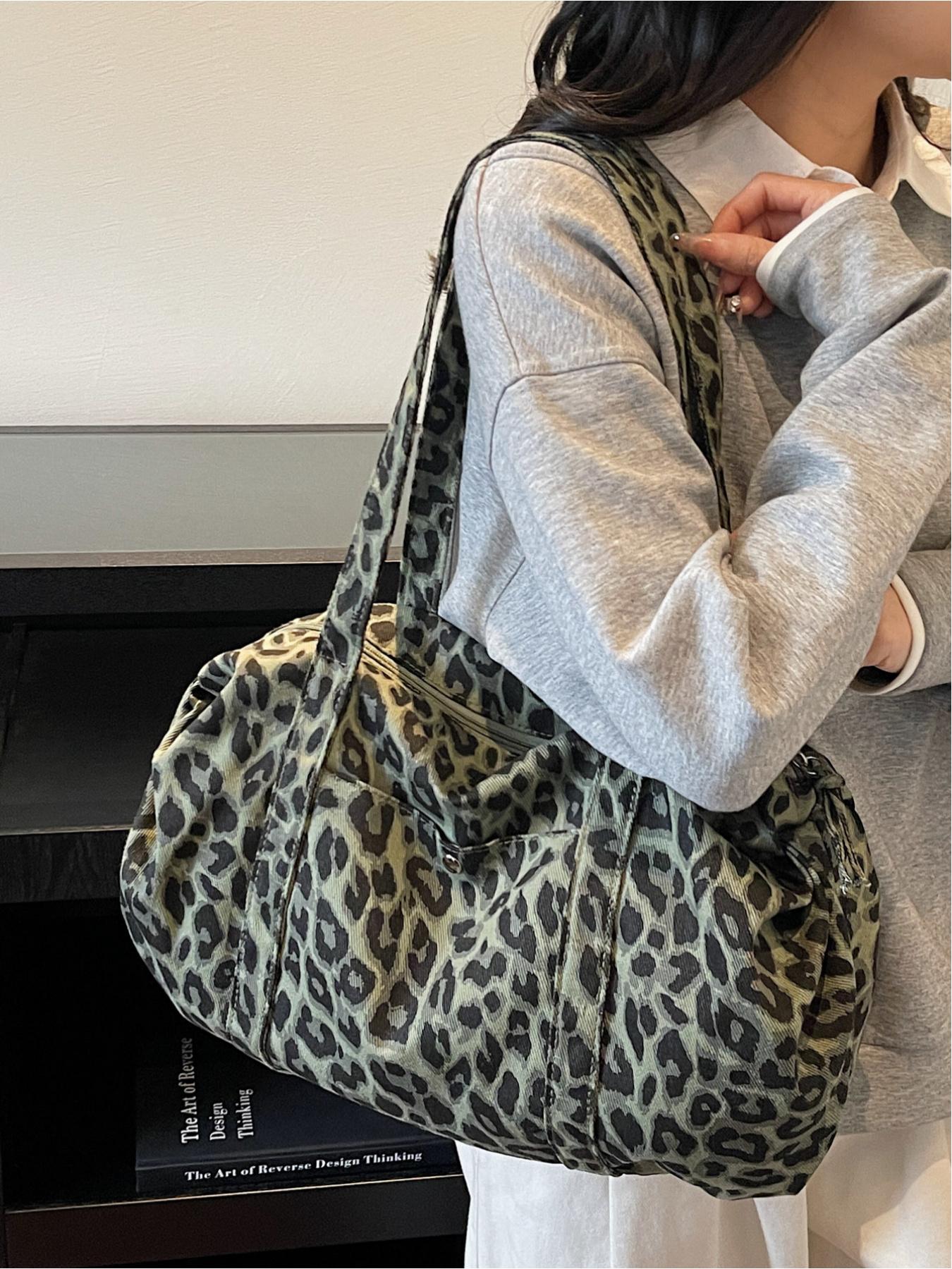 Large capacity denim leopard print luggage bag, made of tough fabric suitable for urban life, with non glaring prints, niche design, versatile tote bag, convenient sports bag, Denim shoulder satchel
