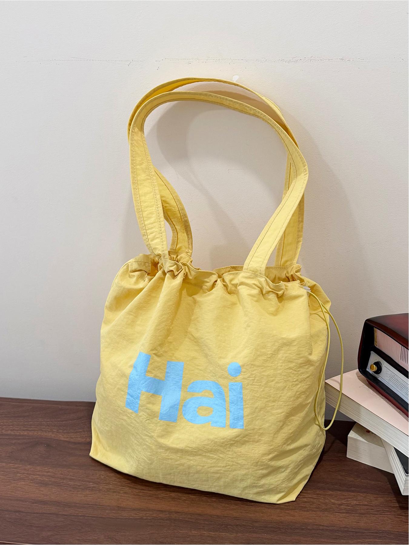 Large capacity drawstring tote bag with letters, simple casual shoulder bag, lightweight and comfortable, street style, work, shopping, underarm bag
