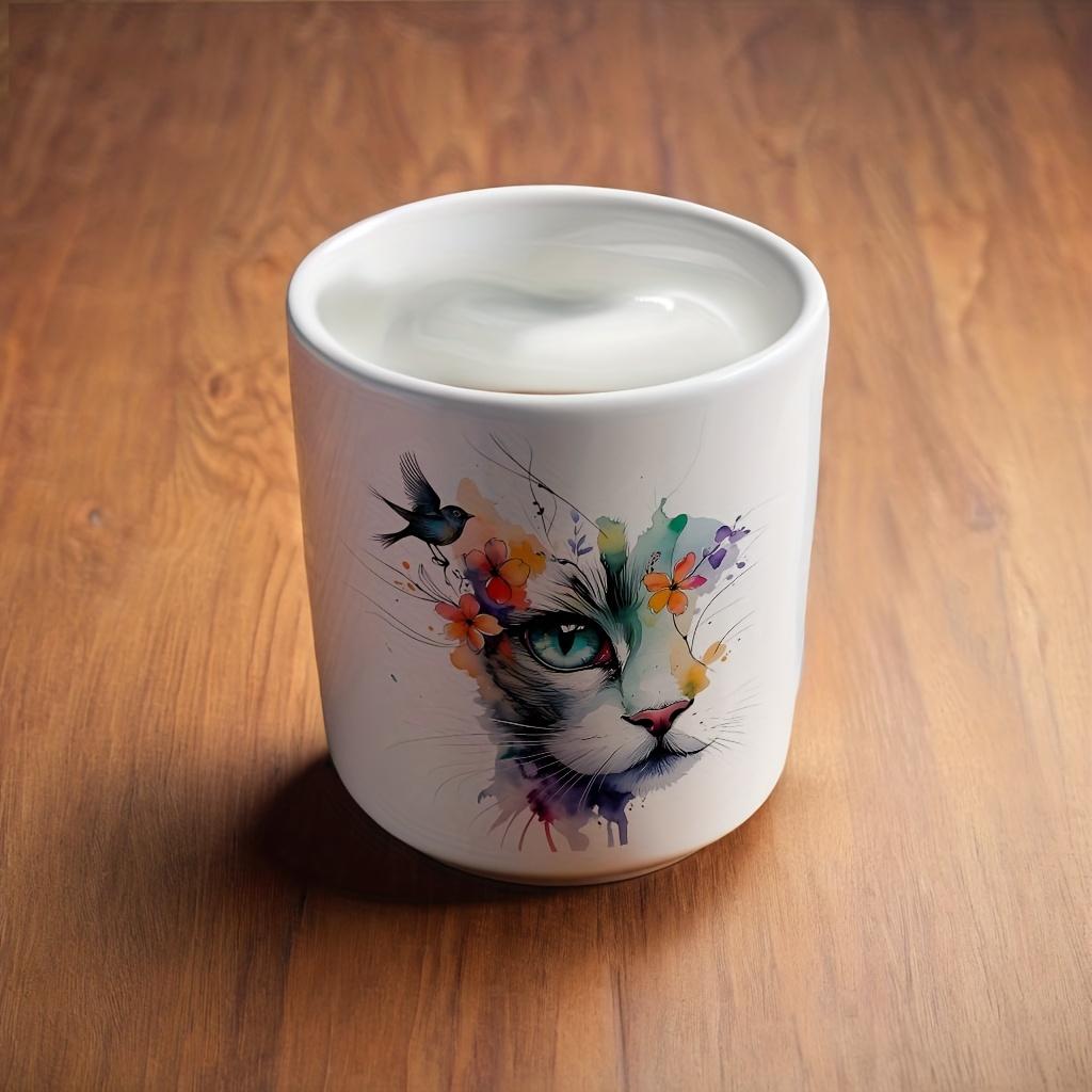 Playful Watercolor Cat Flower Decor: A vibrant artistic depiction set in a color-changing ceramic mug that changes color with temperature and features a heart-shaped handle. Perfect for coffee, this 11oz/330ml mug makes a wonderful Christmas gift