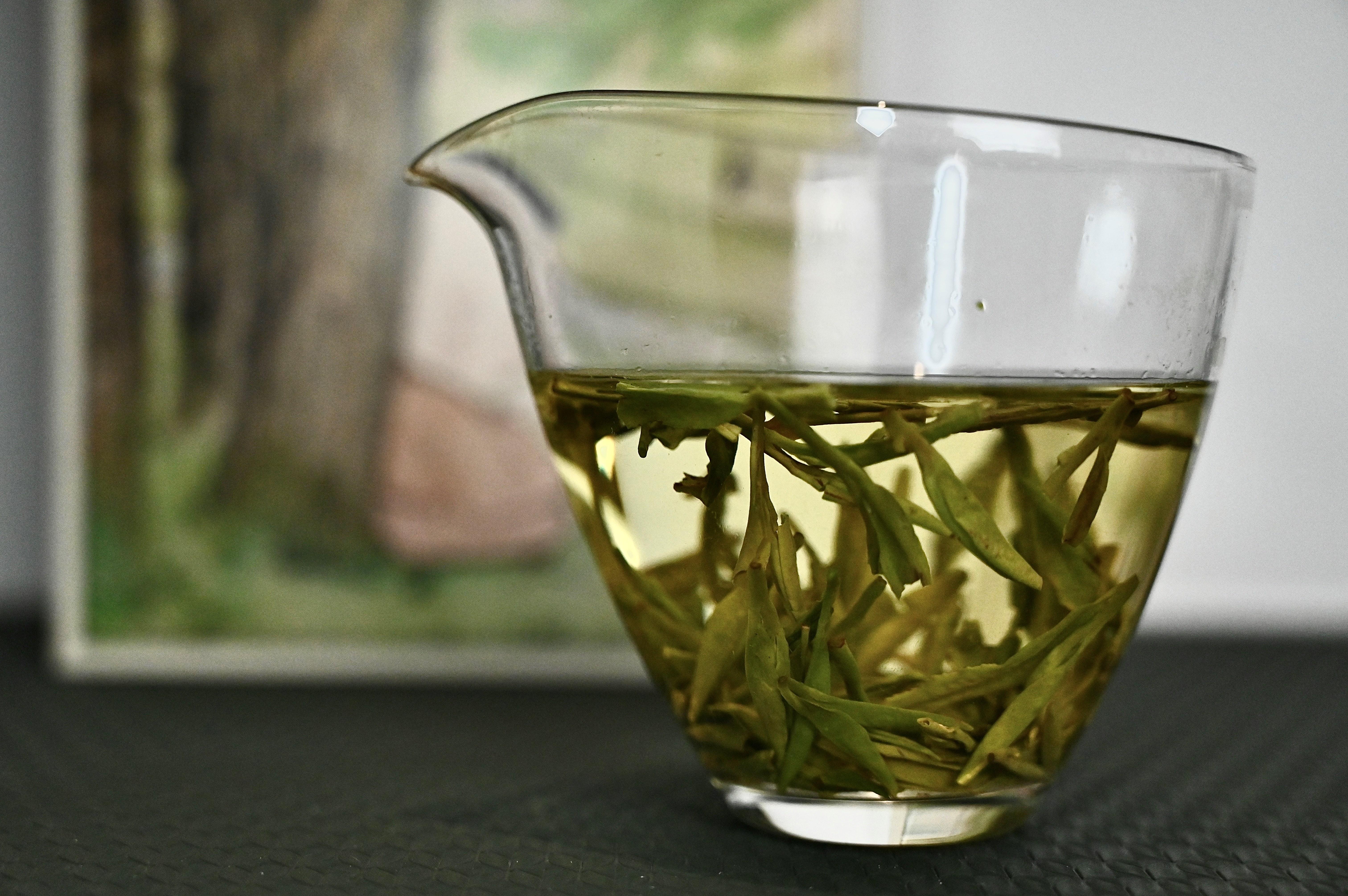 Longjing tea from China, complimentary Chinese porcelain cup