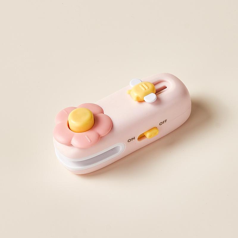 Mini sealing machine Small household sealing machine Hand pressure sealing machine Snack bag Magnetic attraction