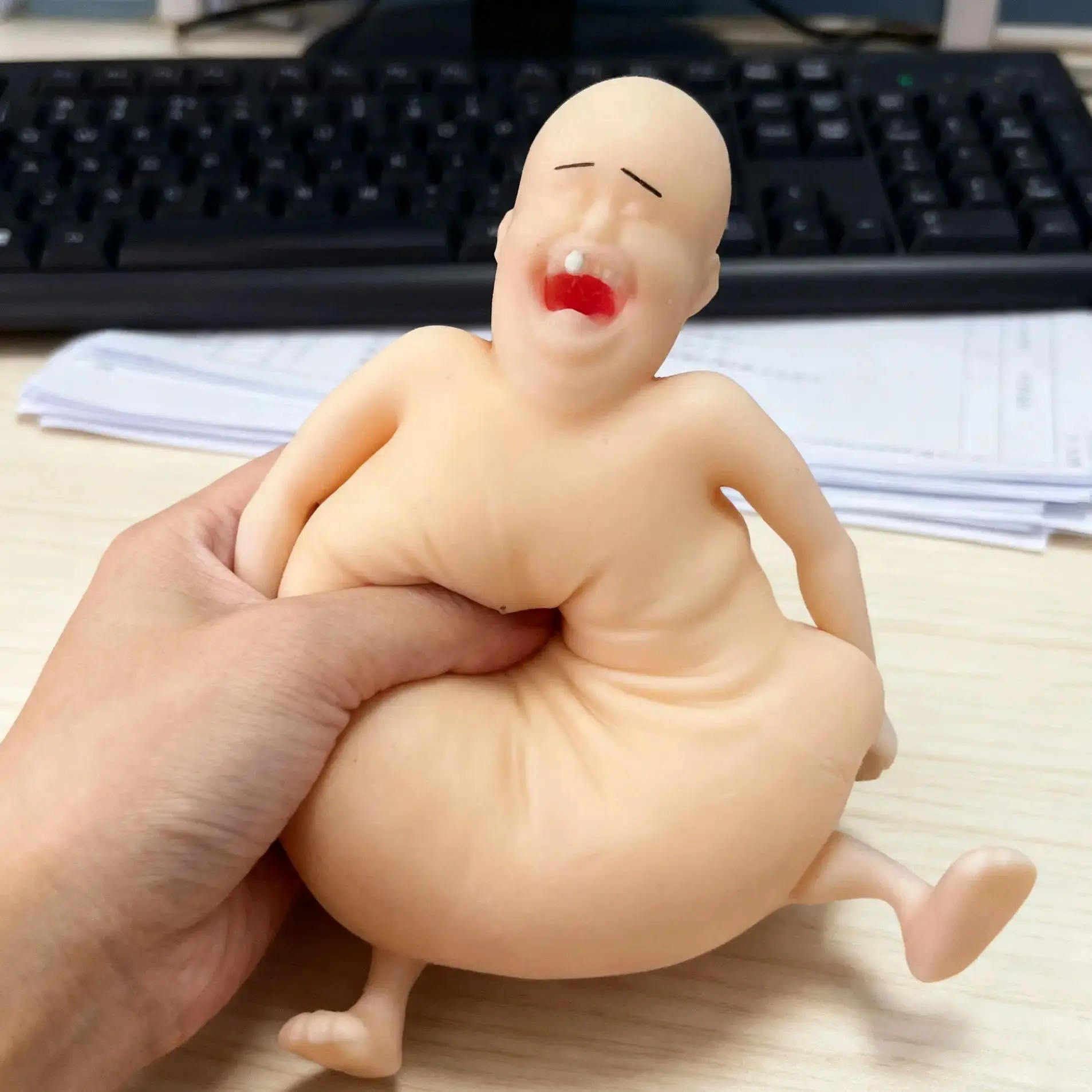Rene Ren é is a Bald Pinched Funny Figurine Stress Relieving Toy Funny Doll with a sticky and Happy smile Ugly doll
