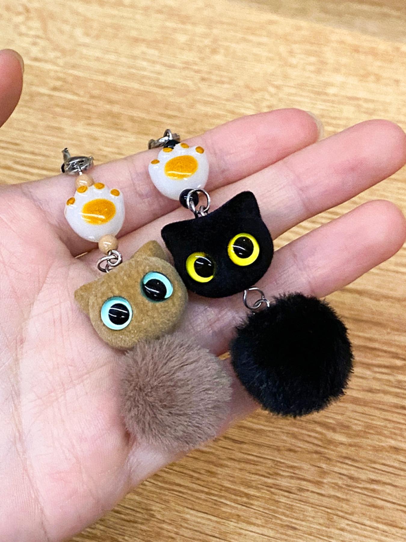 Flocked big-eyed black cat cartoon phone chain pendant, exquisite and cute beaded bag keychain pendant, children's gift