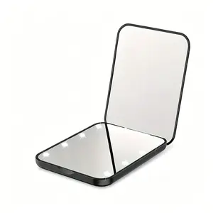 LED lighted foldable handheld mirror with one-touch brightness and HD clarity, 2-in-1 portable design, soft eye-care light for precise makeup and skincare — a chic everyday essential for women.