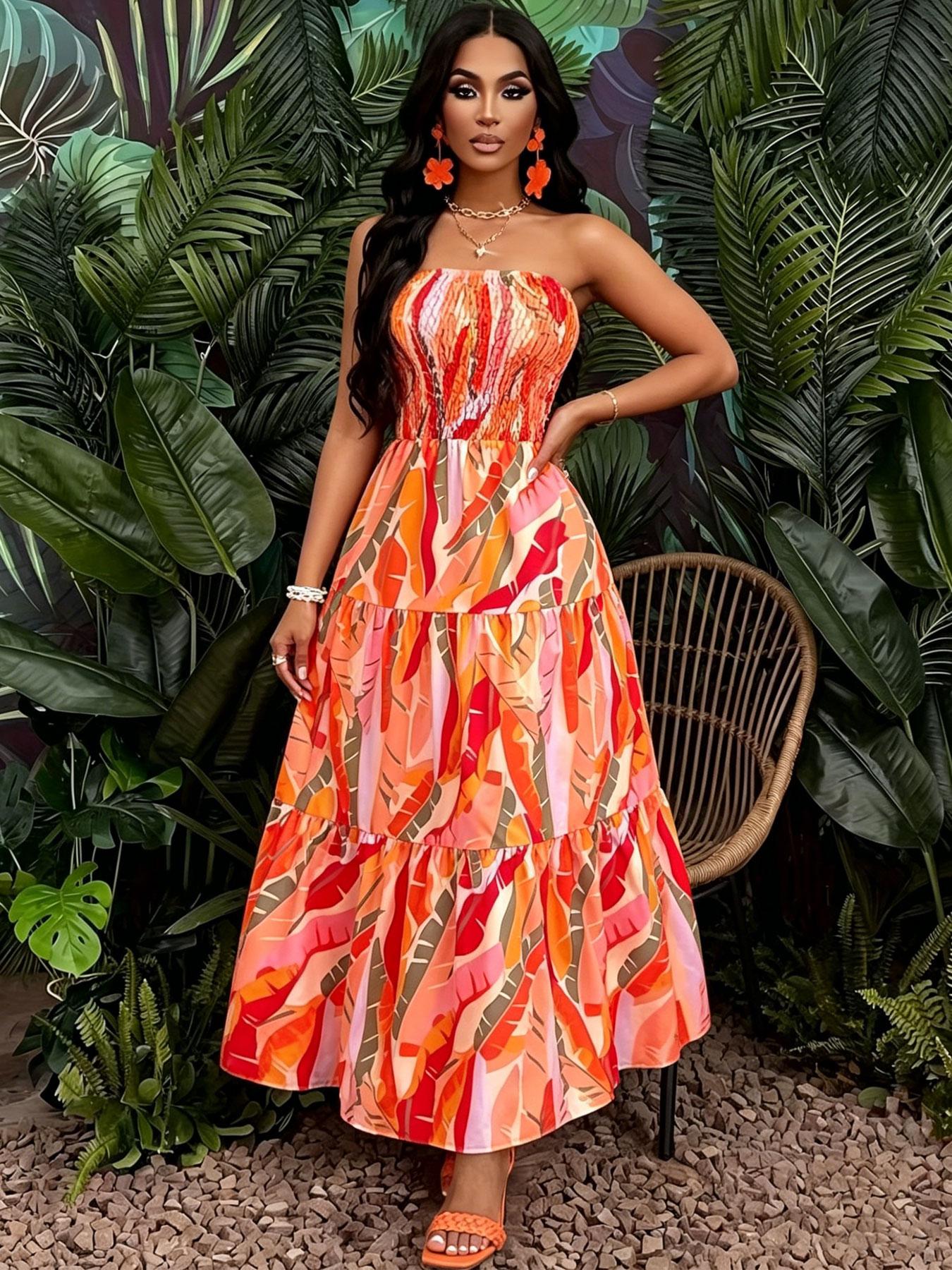 A women's orange-red color-block tropical floral print strapless tube long fashionable dress, suitable for summer, island vacations, tropical trips, and summer parties.
