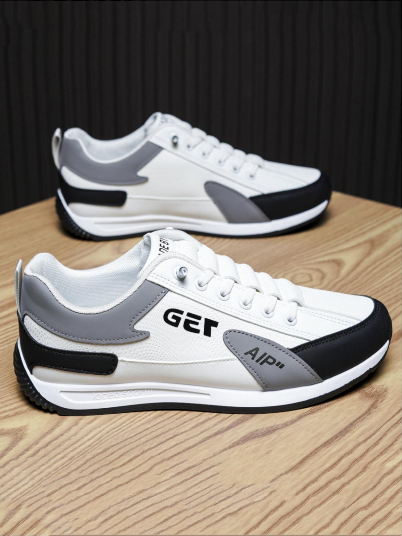 Men's casual sports shoes, simple splicing design for breathability and comfort, contrasting tongue and eye-catching letter logo for fashionable embellishment, ideal for light commuting and sports wear