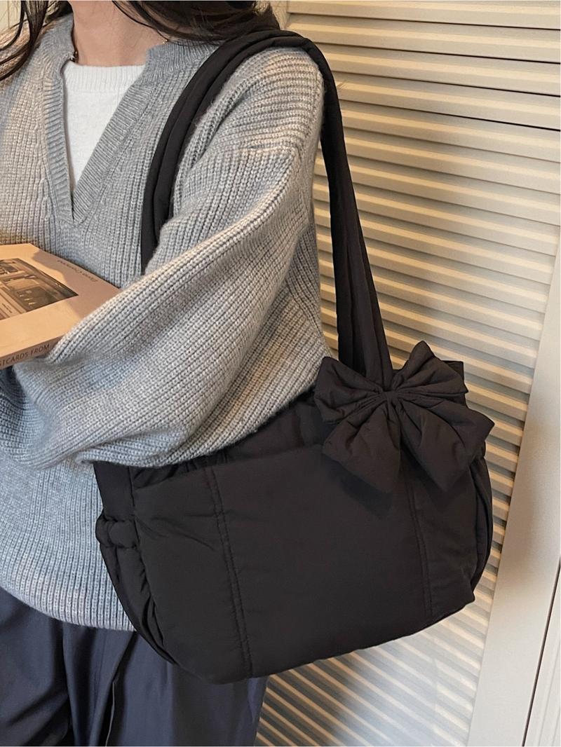 Pink quilted bow tote bag, a gentle, casual, lightweight, and spacious shoulder bag, Casual commuter bag, suitable for commuting, shopping, leisure outings, and everyday accessories.