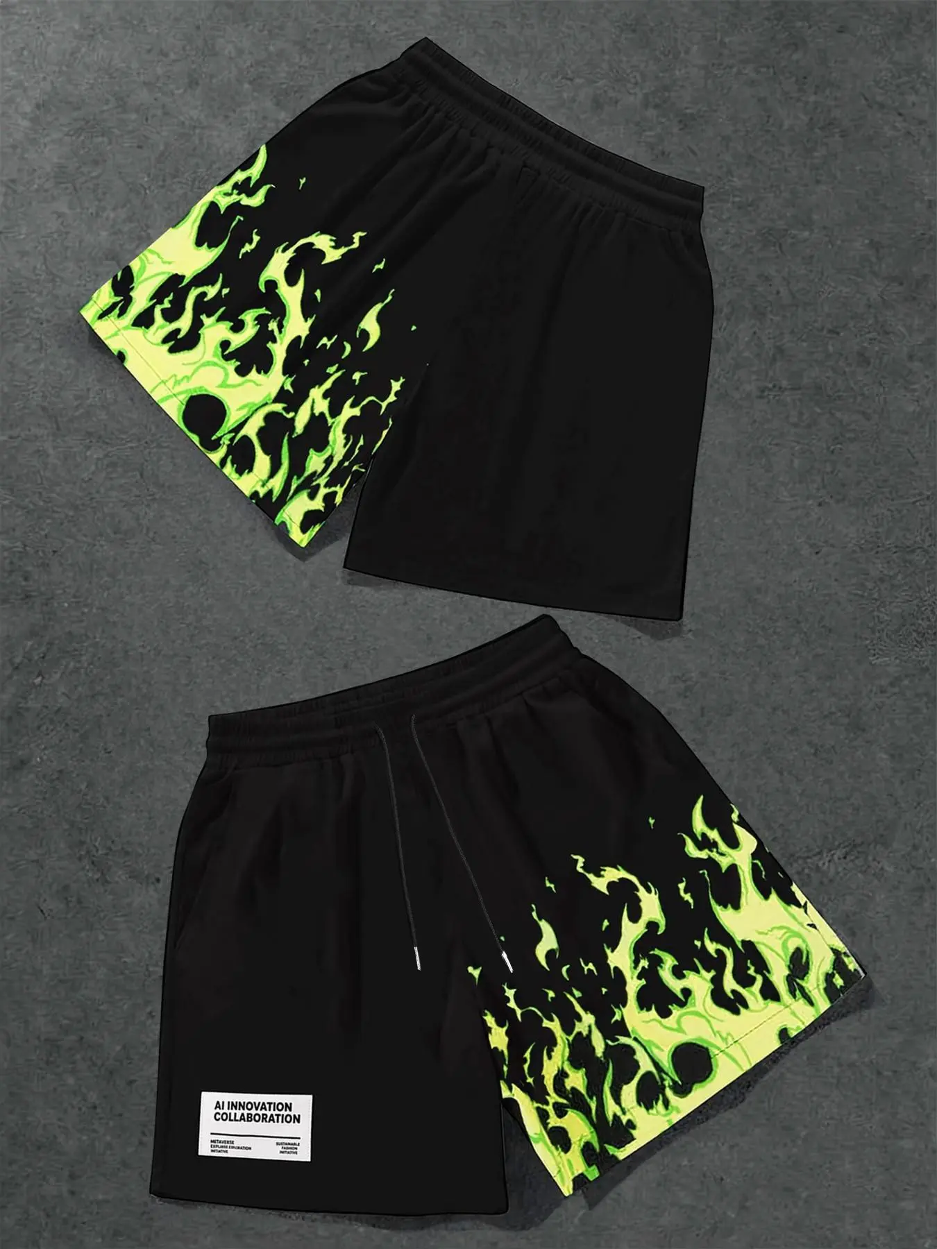 Men's oversized casual sweat shorts in Y2K goth high-street style, featuring asymmetrical gradient pink flame prints along the sides, drawstring elastic waist and five-inch length, ideal for skateboarding, outdoor hangs, gym workouts and everyday summer h