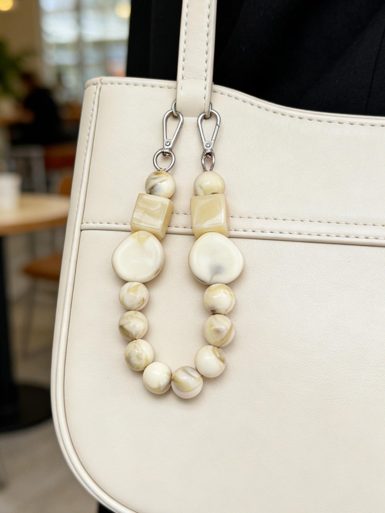 Gentle and fashionable texture bag chain, with irregular shape and round bead bead design, milk white blended color matching, exquisite and practical texture bag hanging, suitable for daily commuting, shopping
