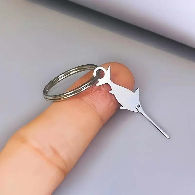 1pc Creative swordfish SIM card extractor, cute cartoon keychain, mobile phone card removal tool, backpack hanging accessories, small gifts, smart phone SIM card ejector, universal thimble extractor, mobile phone card extractor, bag pendant