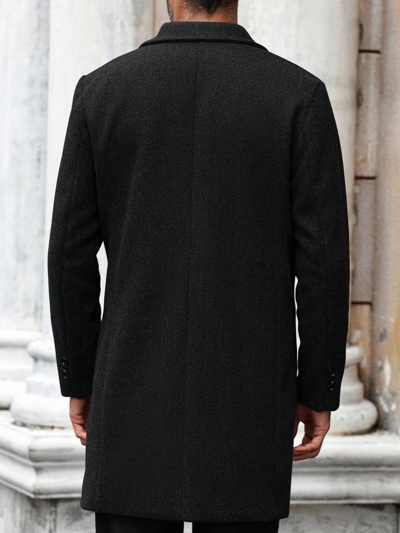 Men's long coat in a wool-blend fabric; a sophisticated, cold-weather staple for autumn and winter. Featuring a minimalist, classic design and a relaxed fit that flatters all body types.