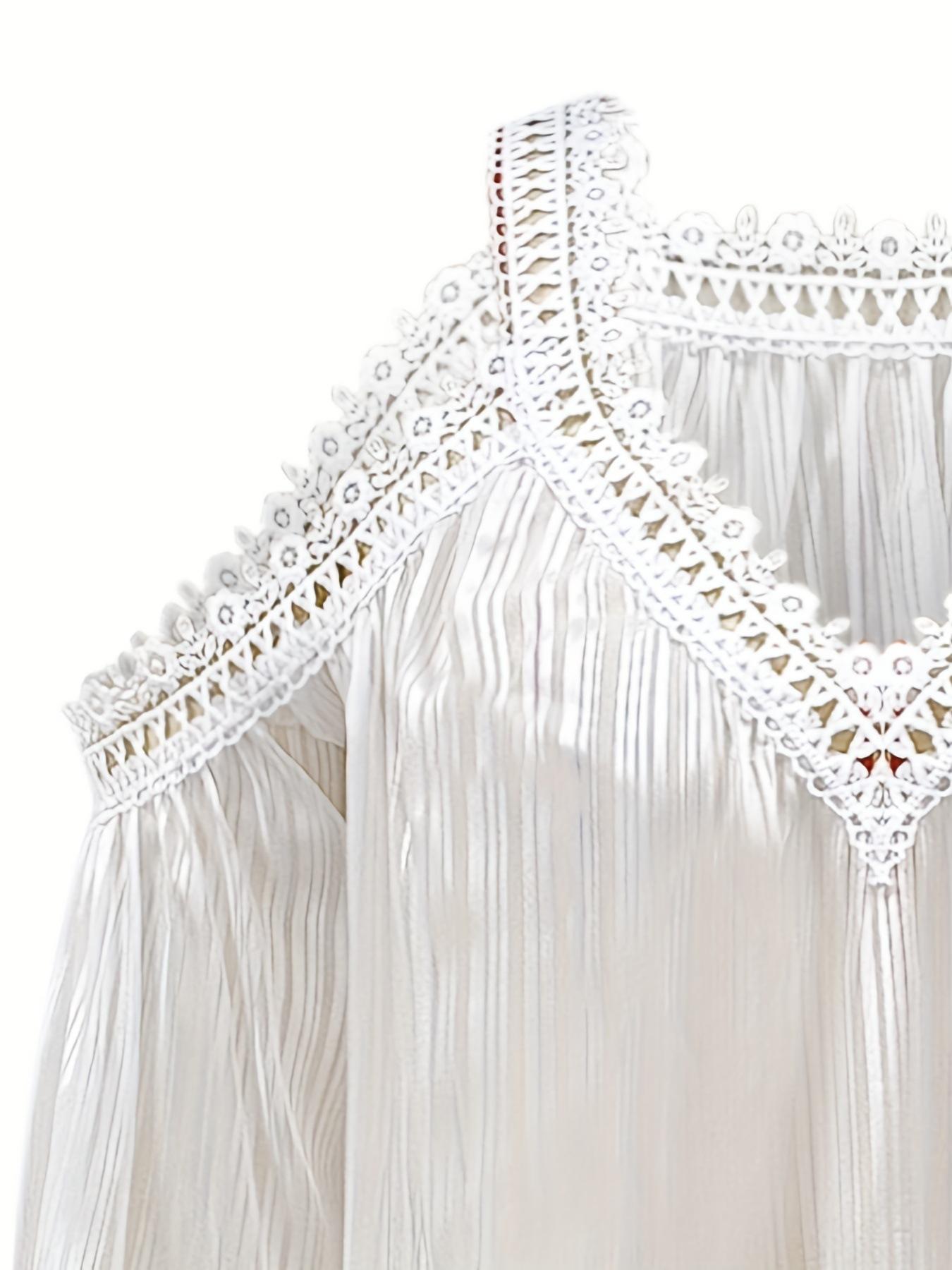 A women's white patchwork lace long-sleeved blouse, loose-fitting and versatile, ideal for casual and laid-back styles.