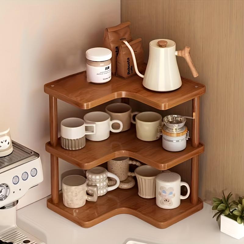The triangular design fits into corner spaces for storage, and the multi-layer design efficiently stores coffee utensils, cups, kitchen sundries, etc Organiser
