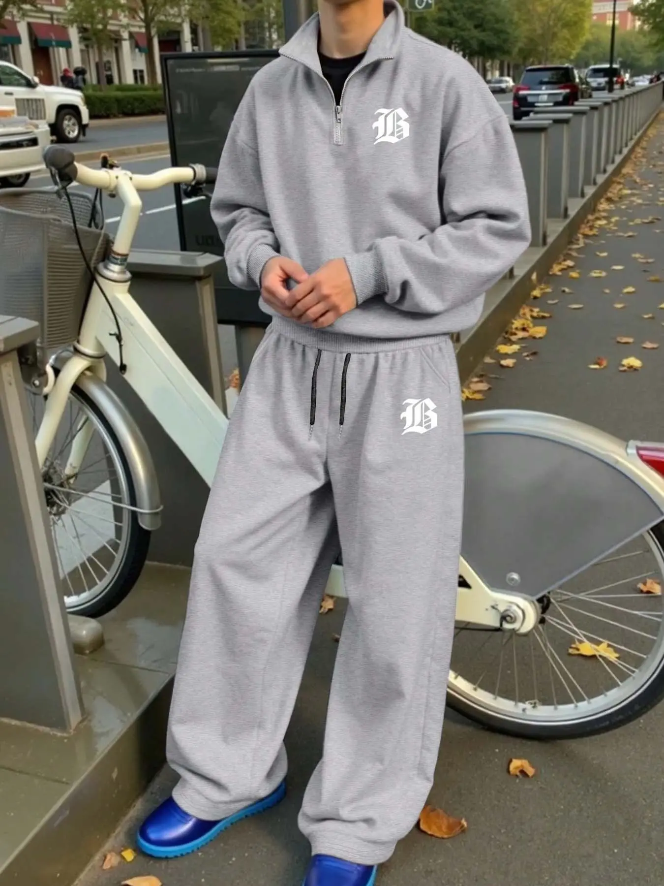 Gray two-piece tracksuit, Gothic letter printed zip-up hoodie & wide-leg drawstring sweatpants, soft and casual street style pairing, ideal for everyday wear, campus, jogging, walking, and minimalist urban street looks.