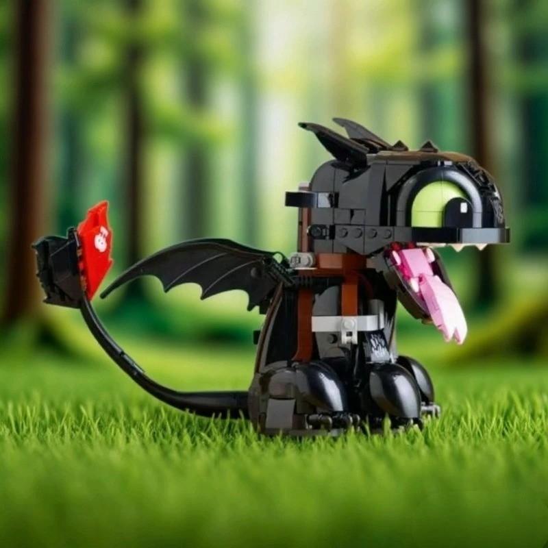 784PCS Classic Anime Movie Series Cute Dragon Pet Animal Series Building Blocks DIY Assembly Model Bricks Home Decoration Toys Suitable for Children's Birthday and Christmas Gifts Comes with Paper
