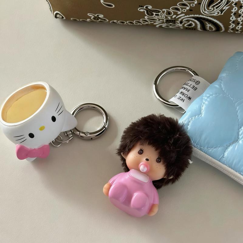Hot-selling cute Hello Kitty and Monchhichi plush keychains, soft rubber 3D pendants, student schoolbag ornaments, car keychains, couple birthday gifts, creative cartoon merchandise, and girly accessories