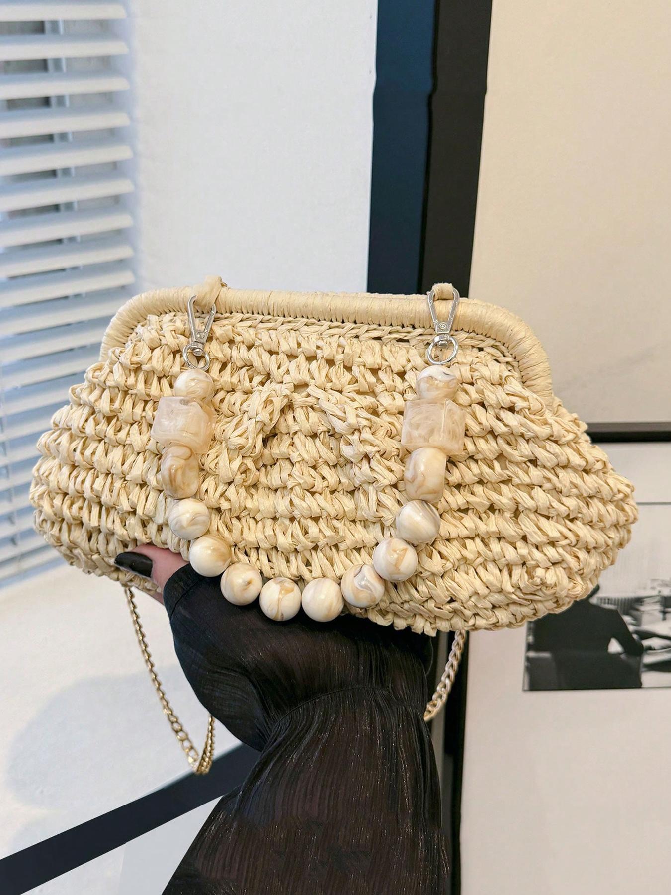 Seaside style simple and casual versatile straw woven handbag, bead hanging decoration, cloud pleated bag type, large storage capacity, vacation and leisure style, suitable for daily travel and dates.