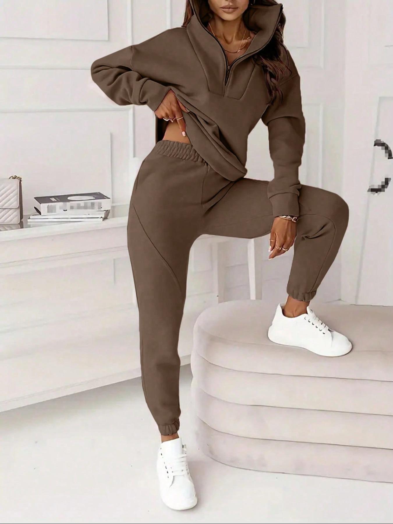 Two-piece women's solid-color crew-neck pullover with long sleeves and elastic waist and loose-fitting bottom pants, perfect for all occasions and versatile in style.