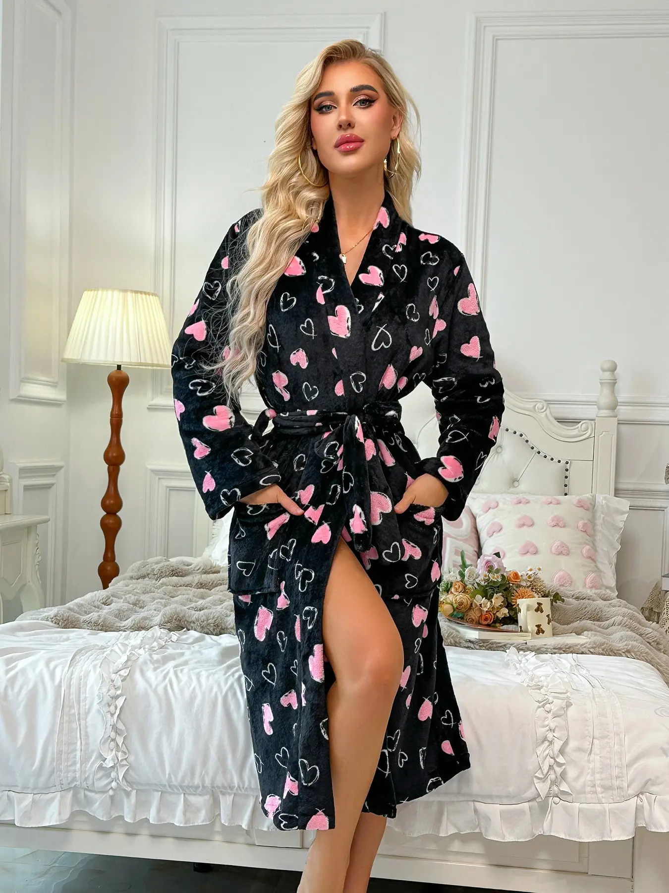 Women's Long Fleece Robe, Long sleeves, black base with all-over pink & white heart print, romantic vibe, Soft skin-friendly thick plush, matching belt and side pockets, warm autumn-winter loungewear for home relaxation & vacation wear