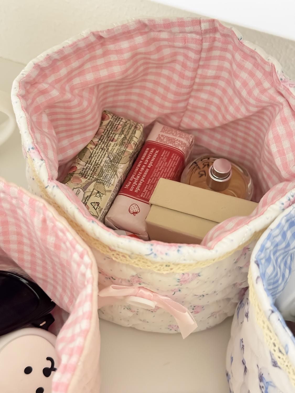 Cute lace bow patchwork storage basket, round fabric desktop organizer box, Instagram-style plaid print storage bin, soft padded makeup storage box, attractive pink bow storage bucket, foldable desktop storage basket