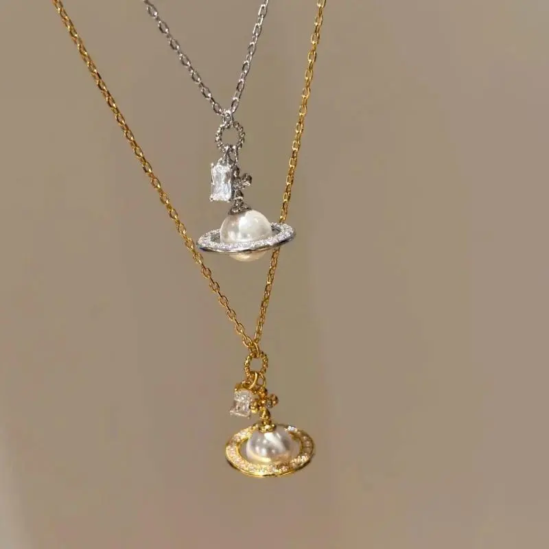 Trendy 3D Saturn Pearl Necklace with CZ Crystal Accents Gold Tone Layerable Chain Statement Necklace for Party Daily Wear