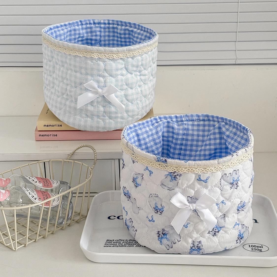 Cute lace bow patchwork storage basket, round fabric desktop organizer box, Instagram-style plaid print storage bin, soft padded makeup storage box, attractive pink bow storage bucket, foldable desktop storage basket