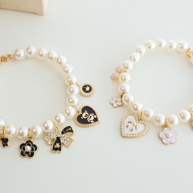 Pet Pearl Necklace Collar |   Vintage Luxury Bow & Camellia Pet Jewelry Pet Collar |   Pearl Necklace Collar for Cats & Dogs |   Vintage Luxury Bow |   Heart Charm |   Noiseless Design |   Camellia Decor  Wedding Birthday Party Photo Props |   Fashion Pet