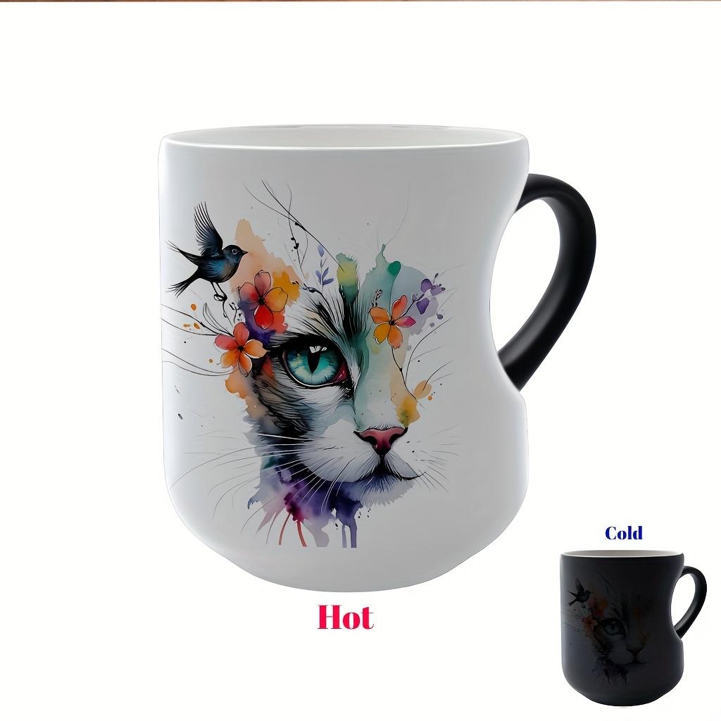 Playful Watercolor Cat Flower Decor: A vibrant artistic depiction set in a color-changing ceramic mug that changes color with temperature and features a heart-shaped handle. Perfect for coffee, this 11oz/330ml mug makes a wonderful Christmas gift