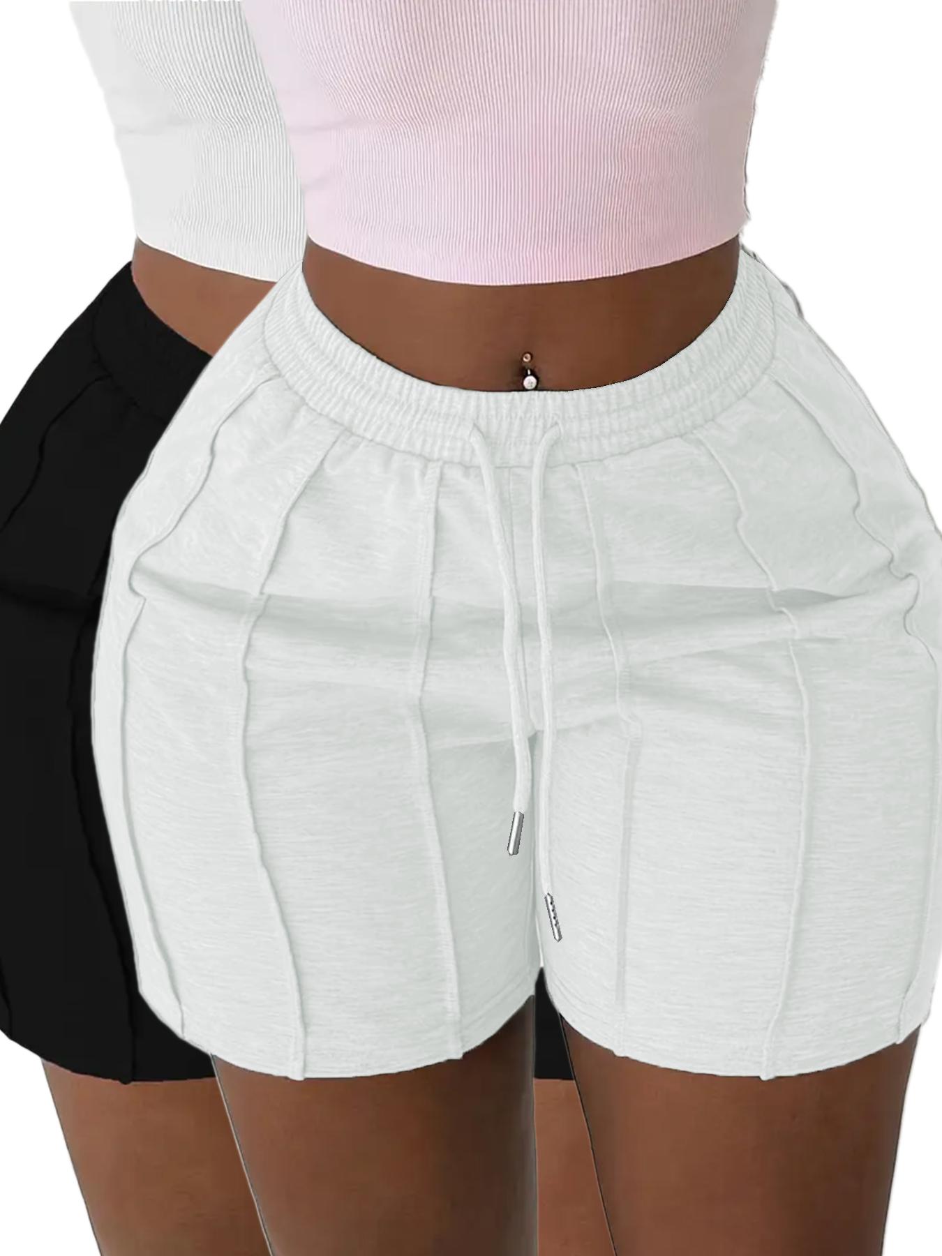 Pack of 2 solid-color drawstring athletic shorts with an elastic waistband and slanted pockets, casual style, suitable for spring, summer, and autumn.
