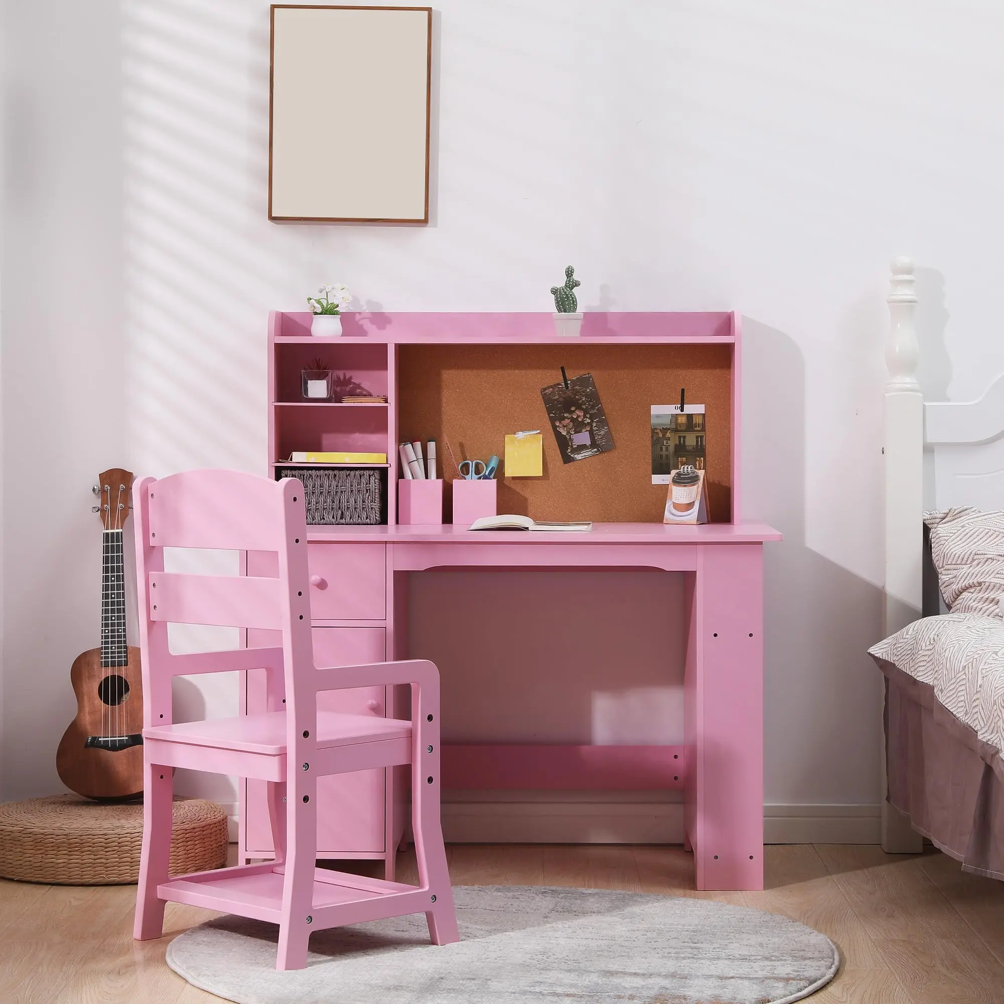 Garvee Study desk and chair set designed for young users, featuring a study table with integrated bookshelf, bulletin board, cabinets, and drawer, available in pink and white colors.