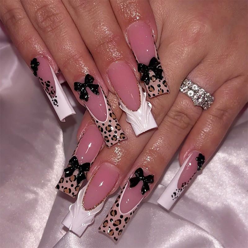 24 Pcs Long Coffin Pink 3D Water Ripple Drip Gel Wild Leopard Print French Press On Nails with Gold Beads, 3D Black Bow, Unique Gold Thin Lines & Sequin Design Removable False Nails with Jelly Glue and Nail File