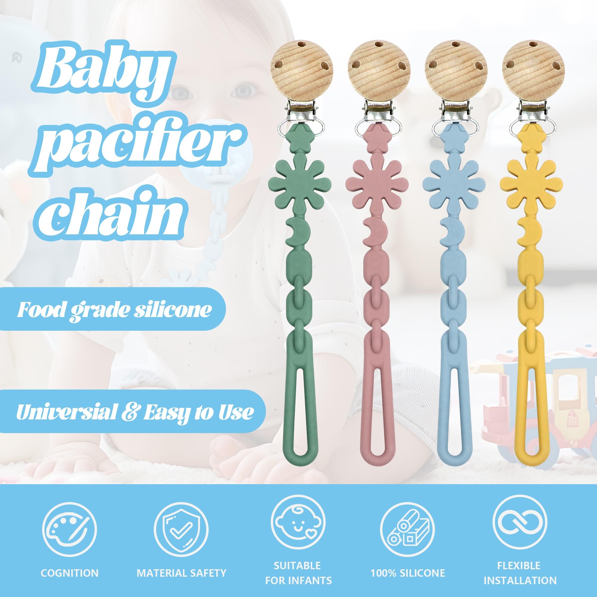 This convenient pacifier chain features a clip to prevent it from ...