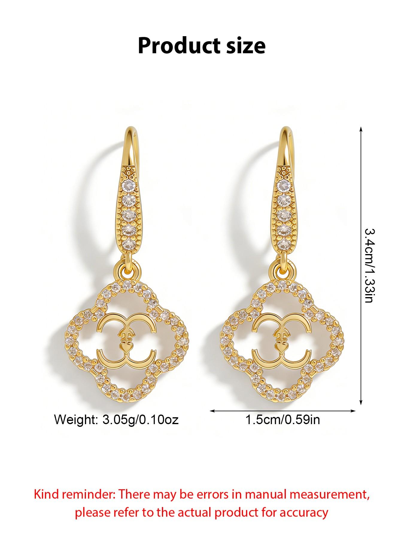A pair of vintage four-leaf clover earrings, elegant petal design, copper-set synthetic zircon drop earrings, exquisite and luxurious