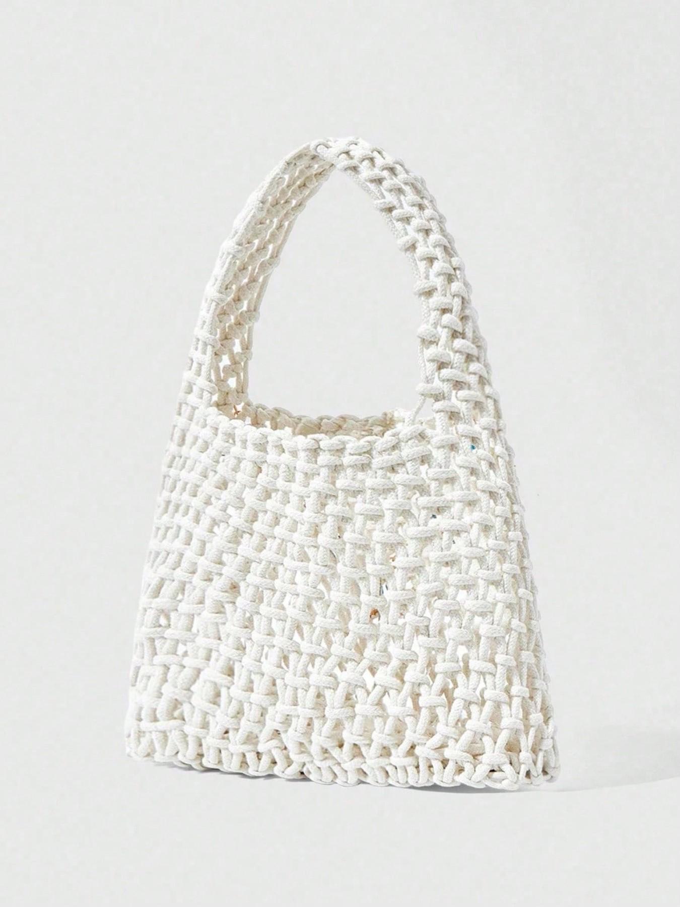 Fresh and artistic style practical texture woven handbag, embellished with starfish, seahorse, shell, pearl, chain, woven long shoulder strap, beige background, suitable for date/vacation dressing scenes