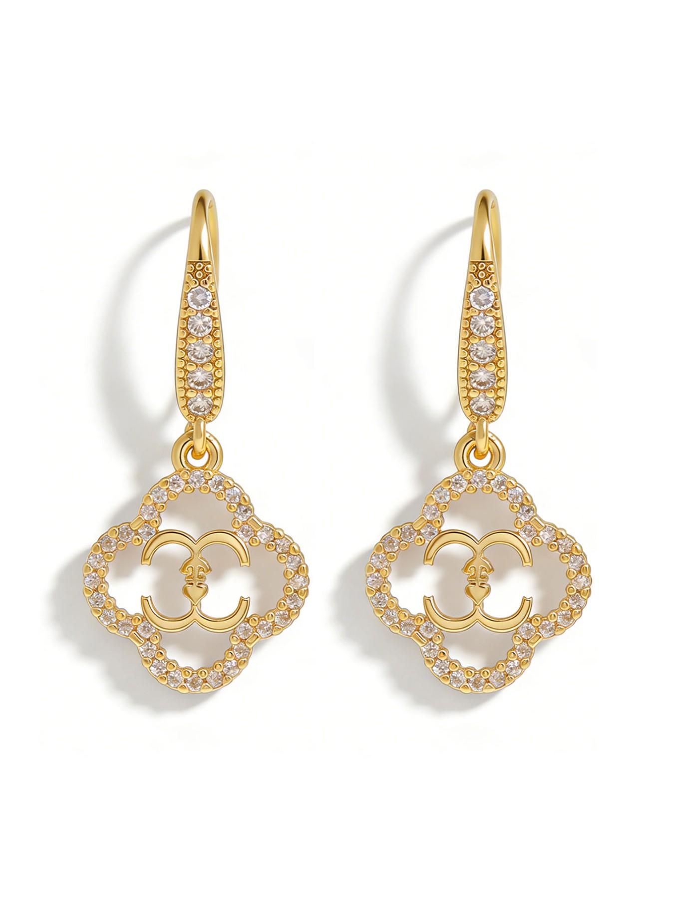 A pair of vintage four-leaf clover earrings, elegant petal design, copper-set synthetic zircon drop earrings, exquisite and luxurious